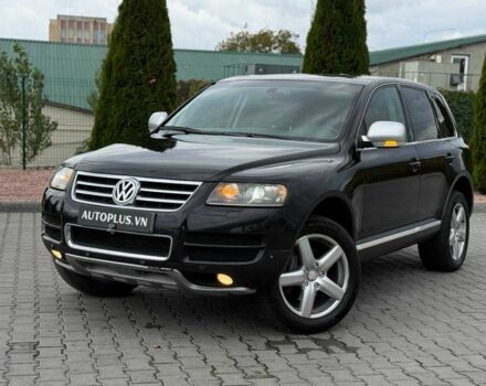 Чорний Фольксваген Туарег, об'ємом двигуна 3 л та пробігом 387 тис. км за 7300 $, фото 1 на Automoto.ua