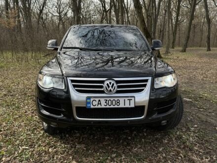 Фольксваген Туарег 2007 у Тальном на Automoto.ua Чорний Фольксваген Туарег, об'ємом двигуна 3 л та пробігом 200 тис. км за 14000 $, фото 1 на Automoto.ua