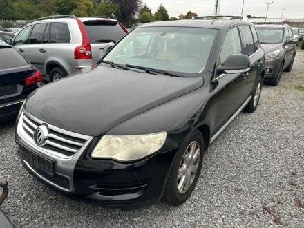 Черный Фольксваген Туарег, объемом двигателя 3 л и пробегом 312 тыс. км за 7300 $, фото 1 на Automoto.ua