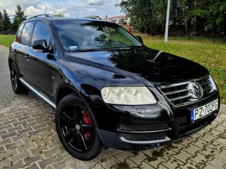 Черный Фольксваген Туарег, объемом двигателя 3 л и пробегом 290 тыс. км за 3200 $, фото 1 на Automoto.ua