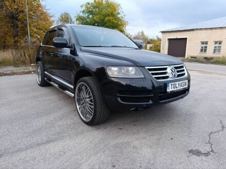 Фольксваген Туарег 2007 у Шостке на Automoto.ua Чорний Фольксваген Туарег, об'ємом двигуна 2 л та пробігом 300 тис. км за 10999 $, фото 1 на Automoto.ua