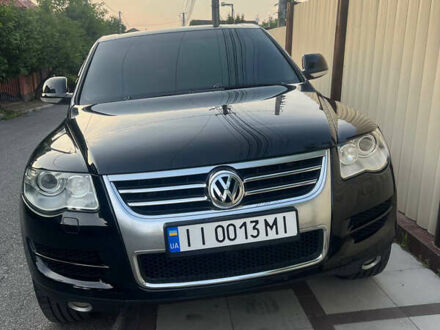 Черный Фольксваген Туарег, объемом двигателя 2.46 л и пробегом 244 тыс. км за 9600 $, фото 1 на Automoto.ua