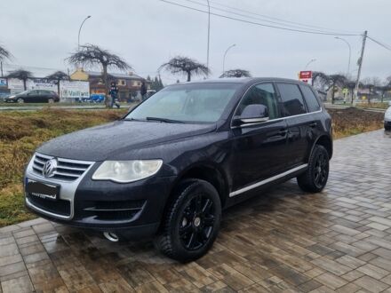 Черный Фольксваген Туарег, объемом двигателя 3 л и пробегом 250 тыс. км за 6648 $, фото 1 на Automoto.ua