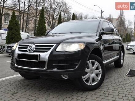 Черный Фольксваген Туарег, объемом двигателя 3 л и пробегом 335 тыс. км за 9803 $, фото 1 на Automoto.ua