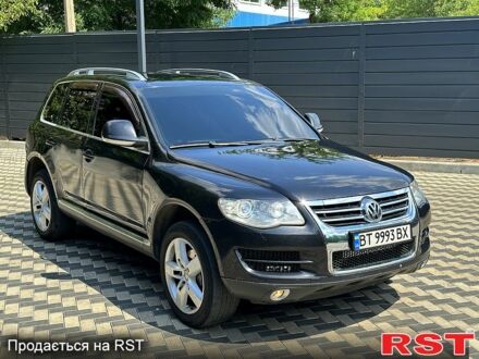 Черный Фольксваген Туарег, объемом двигателя 3 л и пробегом 331 тыс. км за 12999 $, фото 1 на Automoto.ua