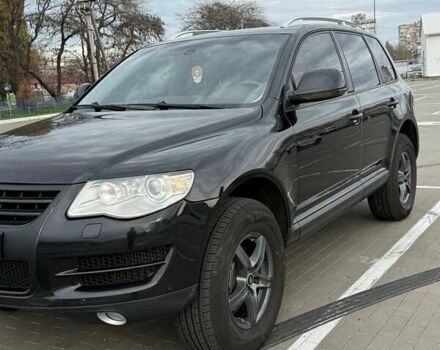 Черный Фольксваген Туарег, объемом двигателя 2.97 л и пробегом 263 тыс. км за 12500 $, фото 1 на Automoto.ua