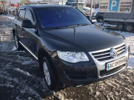 Черный Фольксваген Туарег, объемом двигателя 2.97 л и пробегом 294 тыс. км за 13000 $, фото 1 на Automoto.ua