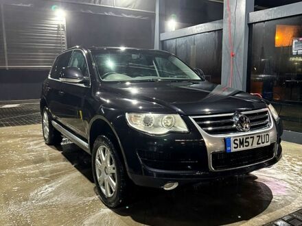 Черный Фольксваген Туарег, объемом двигателя 3 л и пробегом 340 тыс. км за 4500 $, фото 1 на Automoto.ua