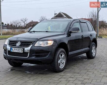 Черный Фольксваген Туарег, объемом двигателя 3 л и пробегом 305 тыс. км за 5850 $, фото 1 на Automoto.ua