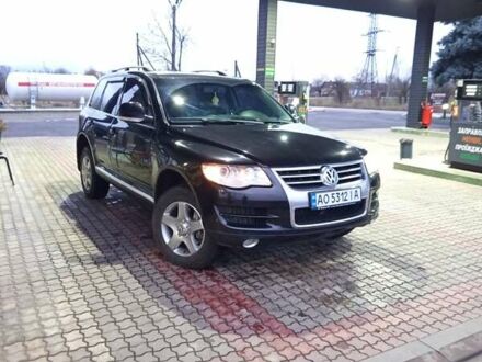 Черный Фольксваген Туарег, объемом двигателя 3 л и пробегом 237 тыс. км за 14300 $, фото 1 на Automoto.ua
