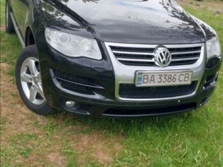 Черный Фольксваген Туарег, объемом двигателя 3 л и пробегом 235 тыс. км за 11000 $, фото 1 на Automoto.ua