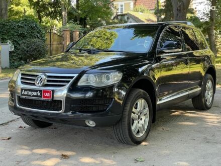 Чорний Фольксваген Туарег, об'ємом двигуна 3 л та пробігом 370 тис. км за 10990 $, фото 1 на Automoto.ua