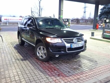 Черный Фольксваген Туарег, объемом двигателя 3 л и пробегом 237 тыс. км за 14300 $, фото 1 на Automoto.ua