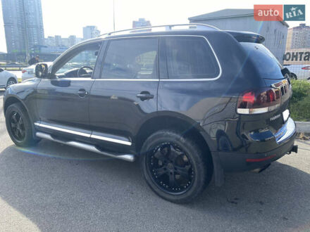 Черный Фольксваген Туарег, объемом двигателя 3 л и пробегом 240 тыс. км за 13000 $, фото 1 на Automoto.ua