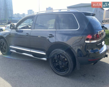 Черный Фольксваген Туарег, объемом двигателя 3 л и пробегом 240 тыс. км за 13000 $, фото 1 на Automoto.ua