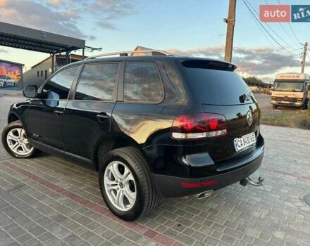 Черный Фольксваген Туарег, объемом двигателя 3 л и пробегом 198 тыс. км за 13086 $, фото 1 на Automoto.ua