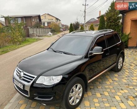 Черный Фольксваген Туарег, объемом двигателя 3 л и пробегом 360 тыс. км за 9800 $, фото 1 на Automoto.ua