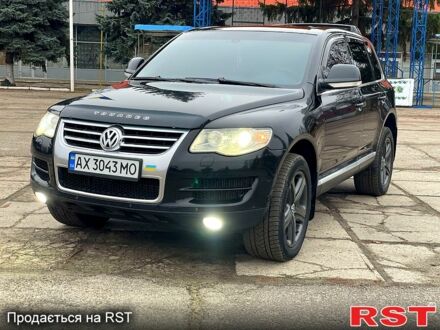 Фольксваген Туарег 2008 у Валках на Automoto.ua Чорний Фольксваген Туарег, об'ємом двигуна 3 л та пробігом 241 тис. км за 10800 $, фото 1 на Automoto.ua
