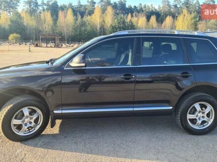 Черный Фольксваген Туарег, объемом двигателя 3 л и пробегом 240 тыс. км за 13000 $, фото 1 на Automoto.ua