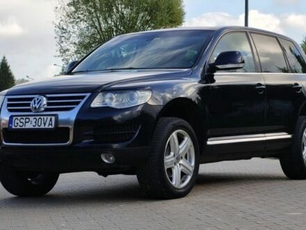 Чорний Фольксваген Туарег, об'ємом двигуна 3 л та пробігом 244 тис. км за 3116 $, фото 1 на Automoto.ua