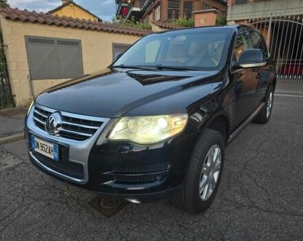 Черный Фольксваген Туарег, объемом двигателя 3 л и пробегом 287 тыс. км за 3259 $, фото 1 на Automoto.ua