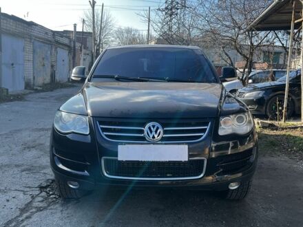 Чорний Фольксваген Туарег, об'ємом двигуна 3 л та пробігом 335 тис. км за 8499 $, фото 1 на Automoto.ua