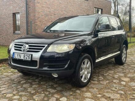 Чорний Фольксваген Туарег, об'ємом двигуна 3 л та пробігом 379 тис. км за 6630 $, фото 1 на Automoto.ua