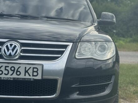Черный Фольксваген Туарег, объемом двигателя 3 л и пробегом 255 тыс. км за 14500 $, фото 1 на Automoto.ua