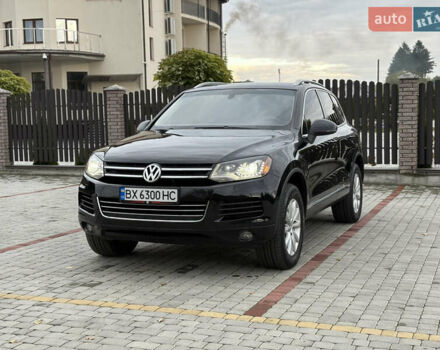 Черный Фольксваген Туарег, объемом двигателя 3 л и пробегом 150 тыс. км за 17500 $, фото 1 на Automoto.ua