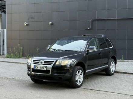 Фольксваген Туарег 2010 в Славянске на Automoto.ua Черный Фольксваген Туарег, объемом двигателя 3 л и пробегом 250 тыс. км за 6750 $, фото 1 на Automoto.ua
