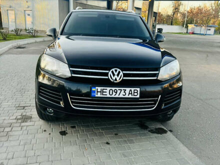 Черный Фольксваген Туарег, объемом двигателя 2.97 л и пробегом 400 тыс. км за 16000 $, фото 1 на Automoto.ua