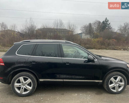 Черный Фольксваген Туарег, объемом двигателя 2.97 л и пробегом 350 тыс. км за 15799 $, фото 1 на Automoto.ua