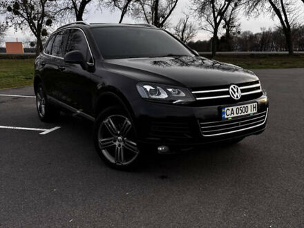 Черный Фольксваген Туарег, объемом двигателя 2.97 л и пробегом 318 тыс. км за 18500 $, фото 1 на Automoto.ua