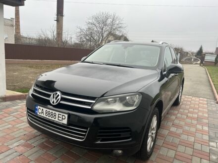 Чорний Фольксваген Туарег, об'ємом двигуна 3 л та пробігом 383 тис. км за 16500 $, фото 1 на Automoto.ua
