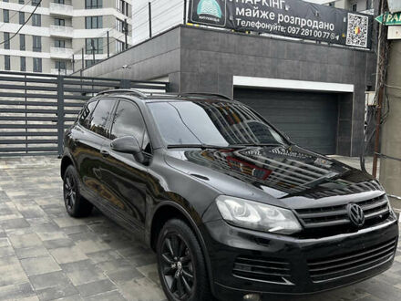 Черный Фольксваген Туарег, объемом двигателя 2.97 л и пробегом 287 тыс. км за 14599 $, фото 1 на Automoto.ua