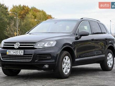 Черный Фольксваген Туарег, объемом двигателя 2.97 л и пробегом 275 тыс. км за 22000 $, фото 1 на Automoto.ua