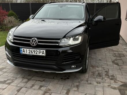 Черный Фольксваген Туарег, объемом двигателя 3 л и пробегом 235 тыс. км за 16700 $, фото 1 на Automoto.ua