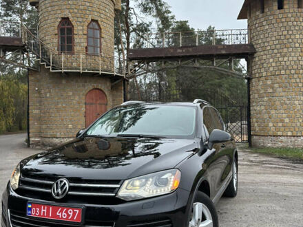 Черный Фольксваген Туарег, объемом двигателя 3 л и пробегом 216 тыс. км за 19500 $, фото 1 на Automoto.ua