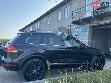 Фольксваген Туарег 2011 у Бродах на Automoto.ua Чорний Фольксваген Туарег, об'ємом двигуна 3 л та пробігом 205 тис. км за 17000 $, фото 1 на Automoto.ua