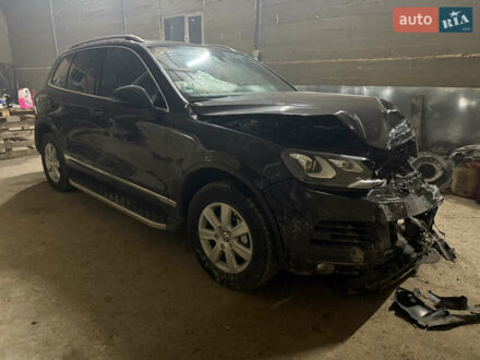 Черный Фольксваген Туарег, объемом двигателя 2.97 л и пробегом 279 тыс. км за 13000 $, фото 1 на Automoto.ua