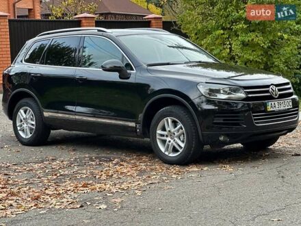 Чорний Фольксваген Туарег, об'ємом двигуна 3 л та пробігом 210 тис. км за 16500 $, фото 1 на Automoto.ua