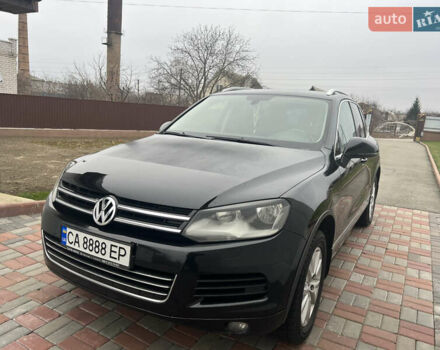 Черный Фольксваген Туарег, объемом двигателя 2.97 л и пробегом 406 тыс. км за 16000 $, фото 1 на Automoto.ua
