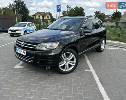 Черный Фольксваген Туарег, объемом двигателя 2.97 л и пробегом 266 тыс. км за 20000 $, фото 1 на Automoto.ua