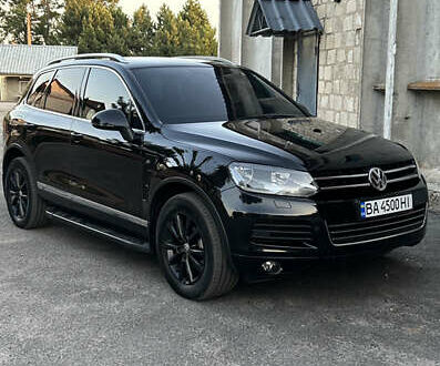 Черный Фольксваген Туарег, объемом двигателя 3 л и пробегом 294 тыс. км за 18500 $, фото 1 на Automoto.ua