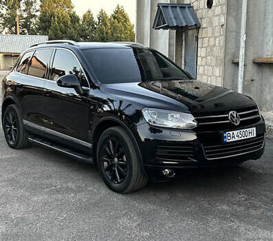 Черный Фольксваген Туарег, объемом двигателя 3 л и пробегом 294 тыс. км за 18500 $, фото 1 на Automoto.ua