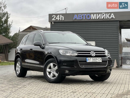 Черный Фольксваген Туарег, объемом двигателя 3 л и пробегом 159 тыс. км за 17500 $, фото 1 на Automoto.ua