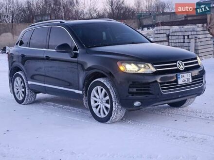 Чорний Фольксваген Туарег, об'ємом двигуна 2.97 л та пробігом 321 тис. км за 17200 $, фото 1 на Automoto.ua