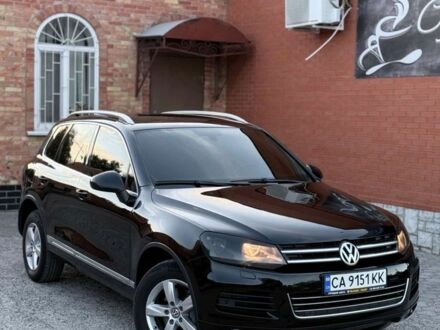Чорний Фольксваген Туарег, об'ємом двигуна 3 л та пробігом 310 тис. км за 15500 $, фото 1 на Automoto.ua