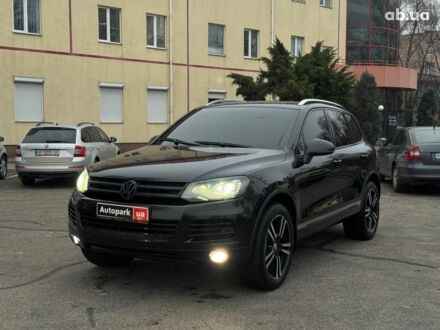 Черный Фольксваген Туарег, объемом двигателя 3 л и пробегом 308 тыс. км за 16490 $, фото 1 на Automoto.ua