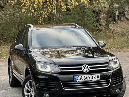 Черный Фольксваген Туарег, объемом двигателя 2.97 л и пробегом 242 тыс. км за 17000 $, фото 1 на Automoto.ua